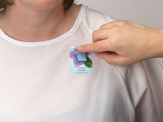 Elequil Aromatabs 373 on patient's medical gown