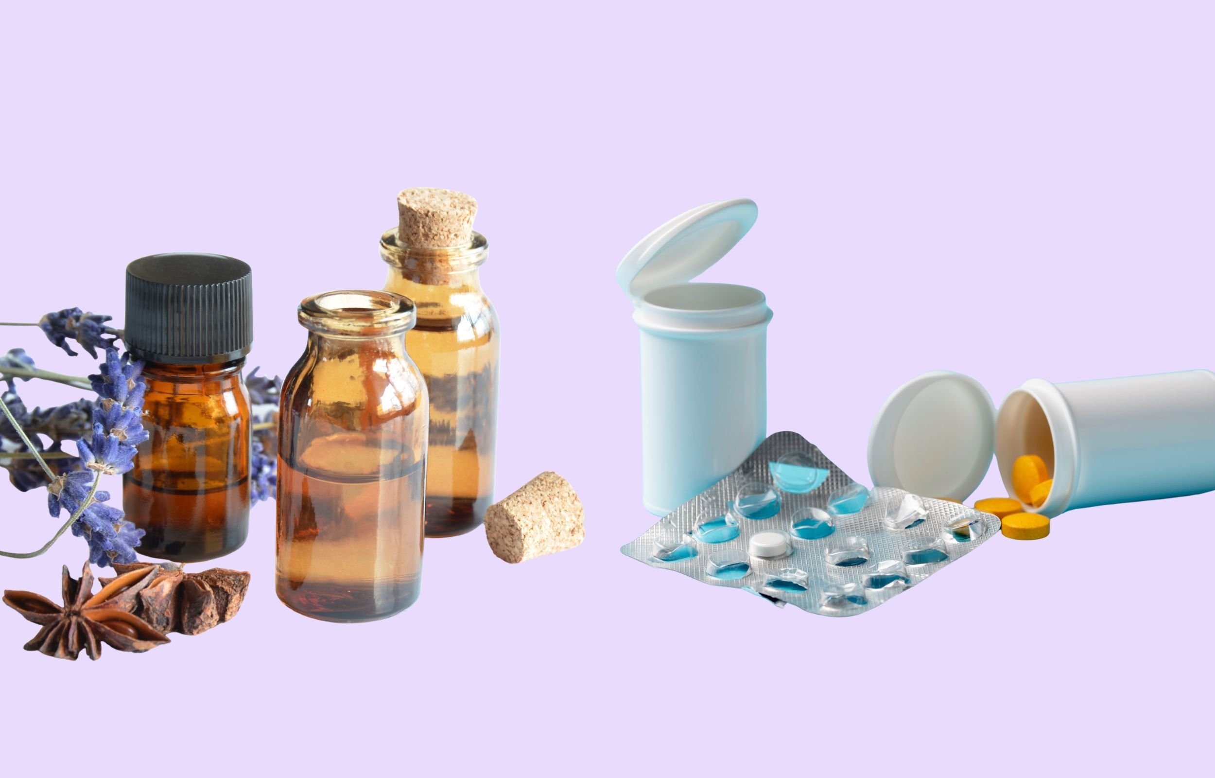 A selection of essential oils next to open pill bottles