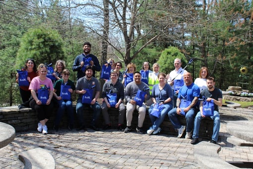 Beekley employees together after an Earth Day cleanup event