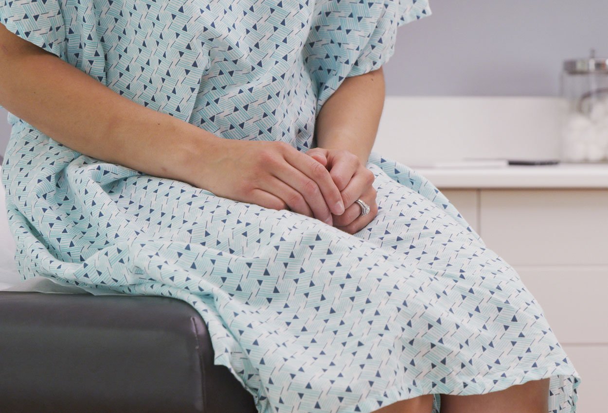 anxious patient waiting in medical examination room