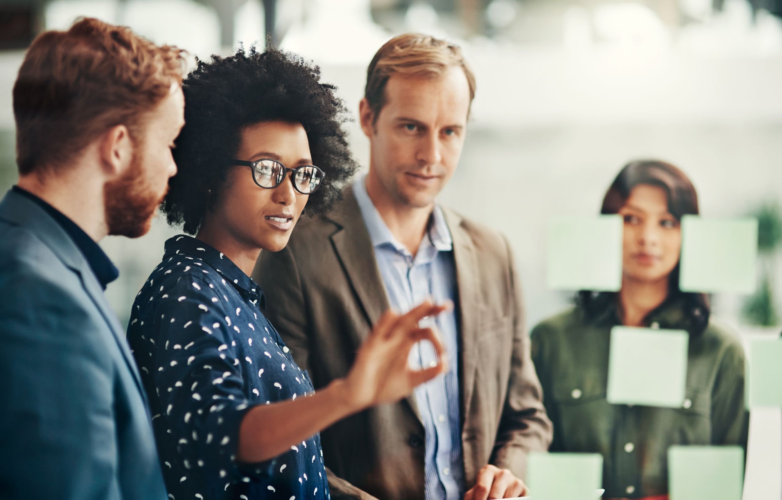 A group of people discussing a product
