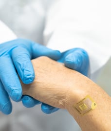 Beekley's MR Spot on a patient's wrist