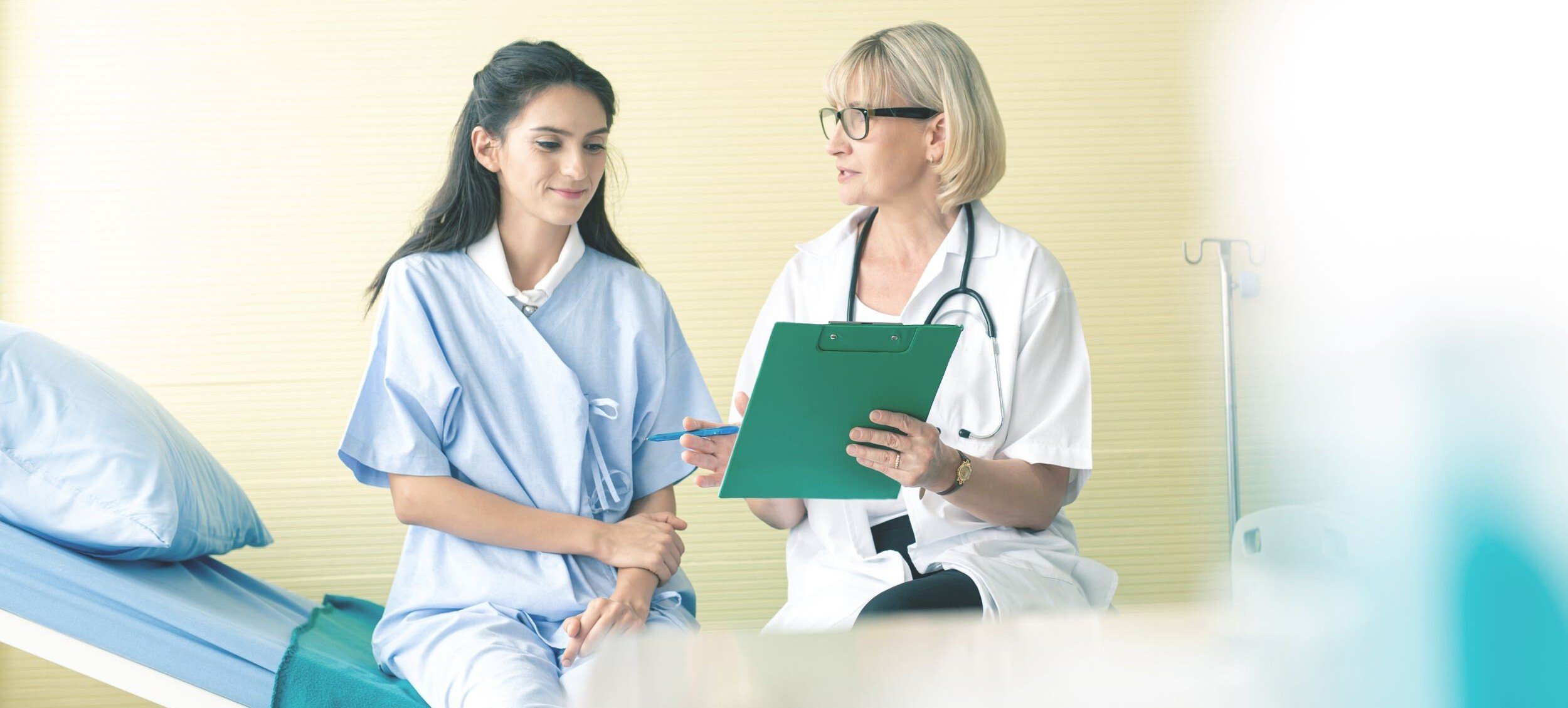 A doctor and patient reviewing a health plan