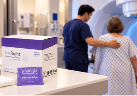 InkRight box in foreground with tech and patient prepping in the background