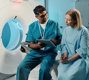 nurse-and-tech-on-machine
