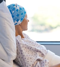 A cancer patient looking out the window.